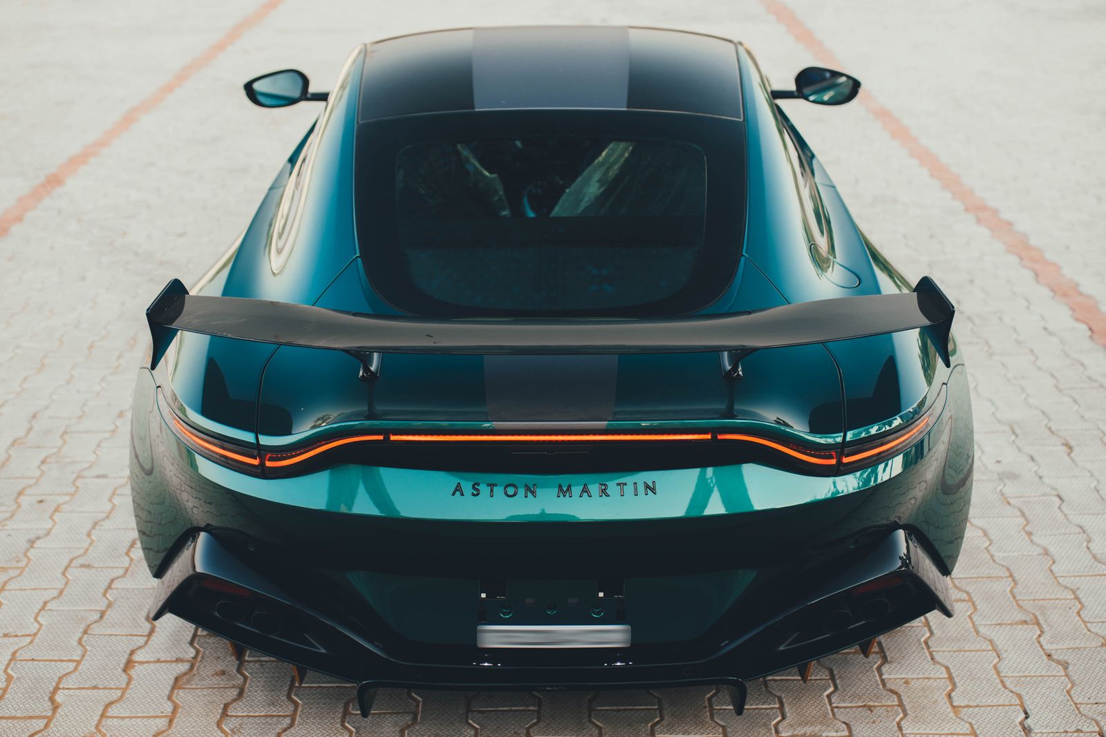 Sleek Aston Martin sports car parked outdoors