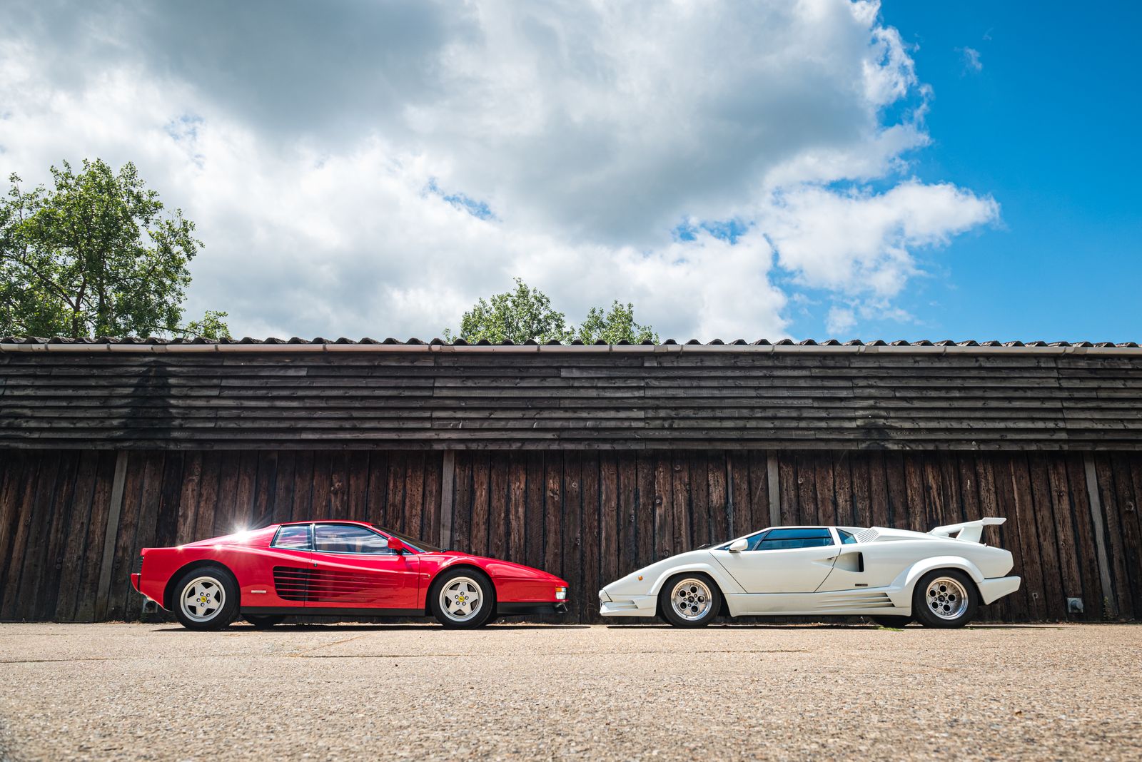 Vintage Ferrari Testarossa and Lamborghini Countach parked together