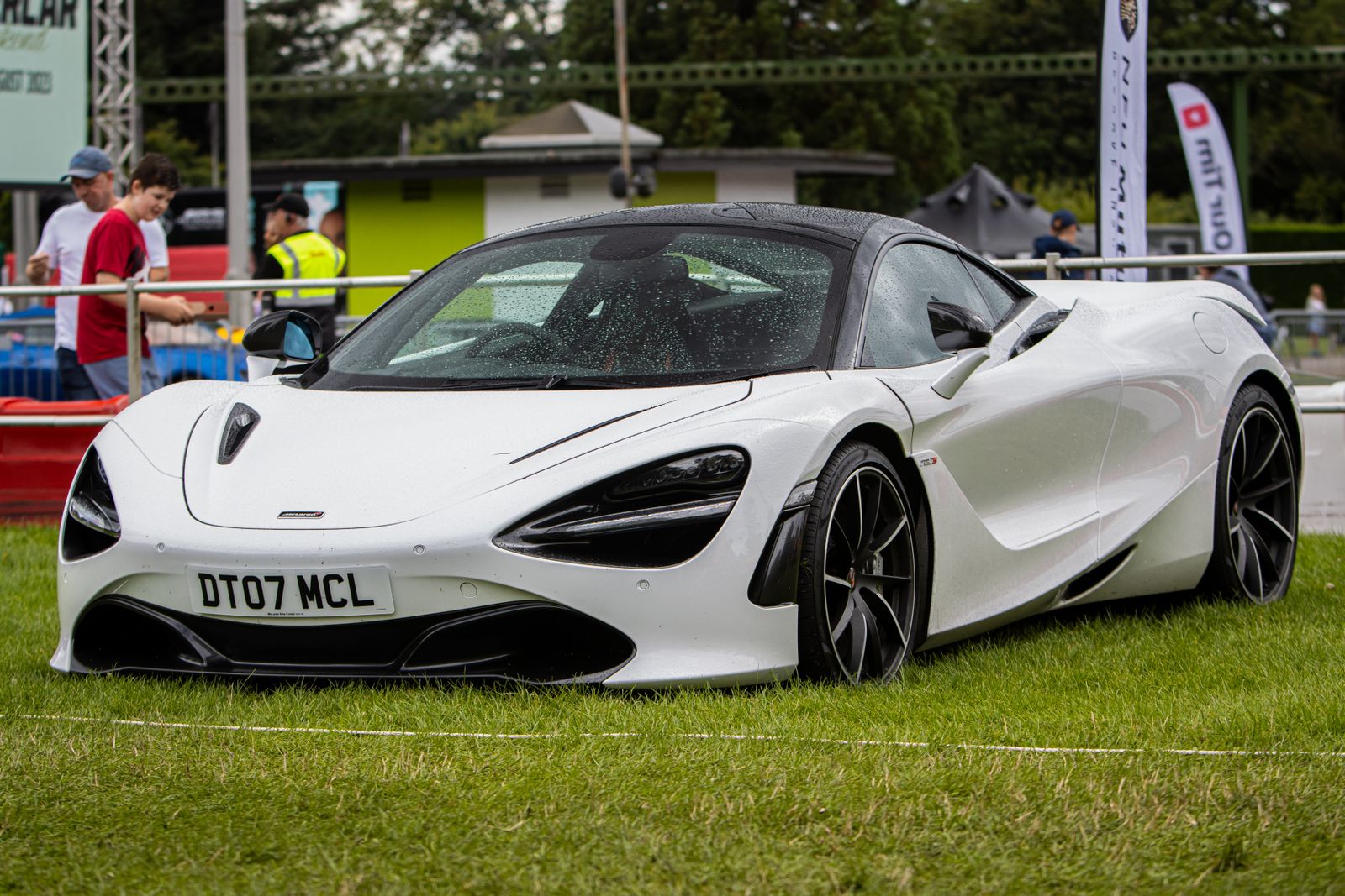 White McLaren 720S at an auto event