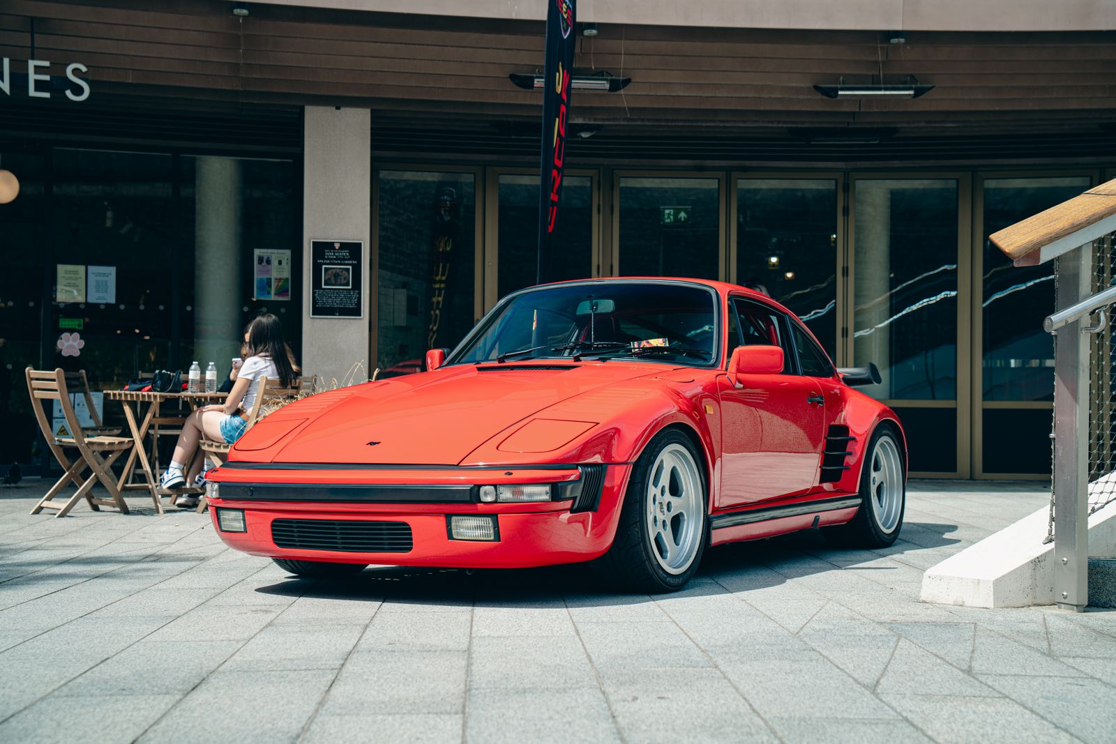 Classic red sports car parked outdoors in Southampton