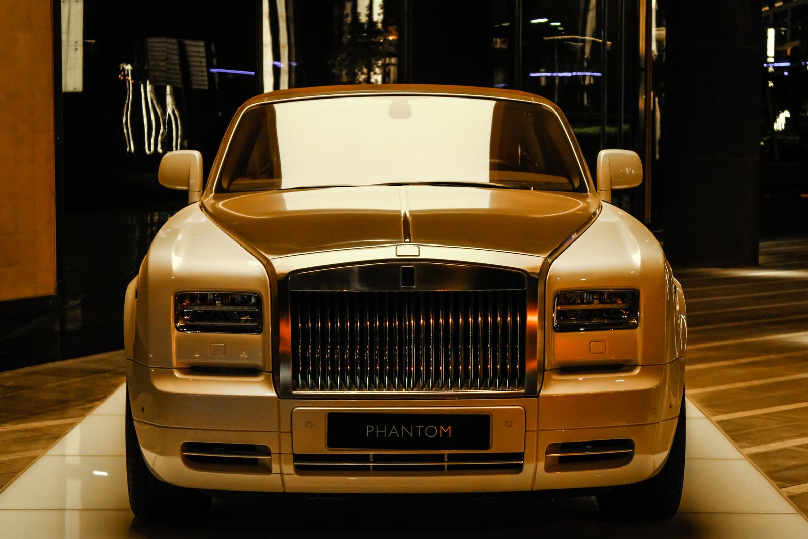 Gold Rolls-Royce Phantom in a Dubai showroom
