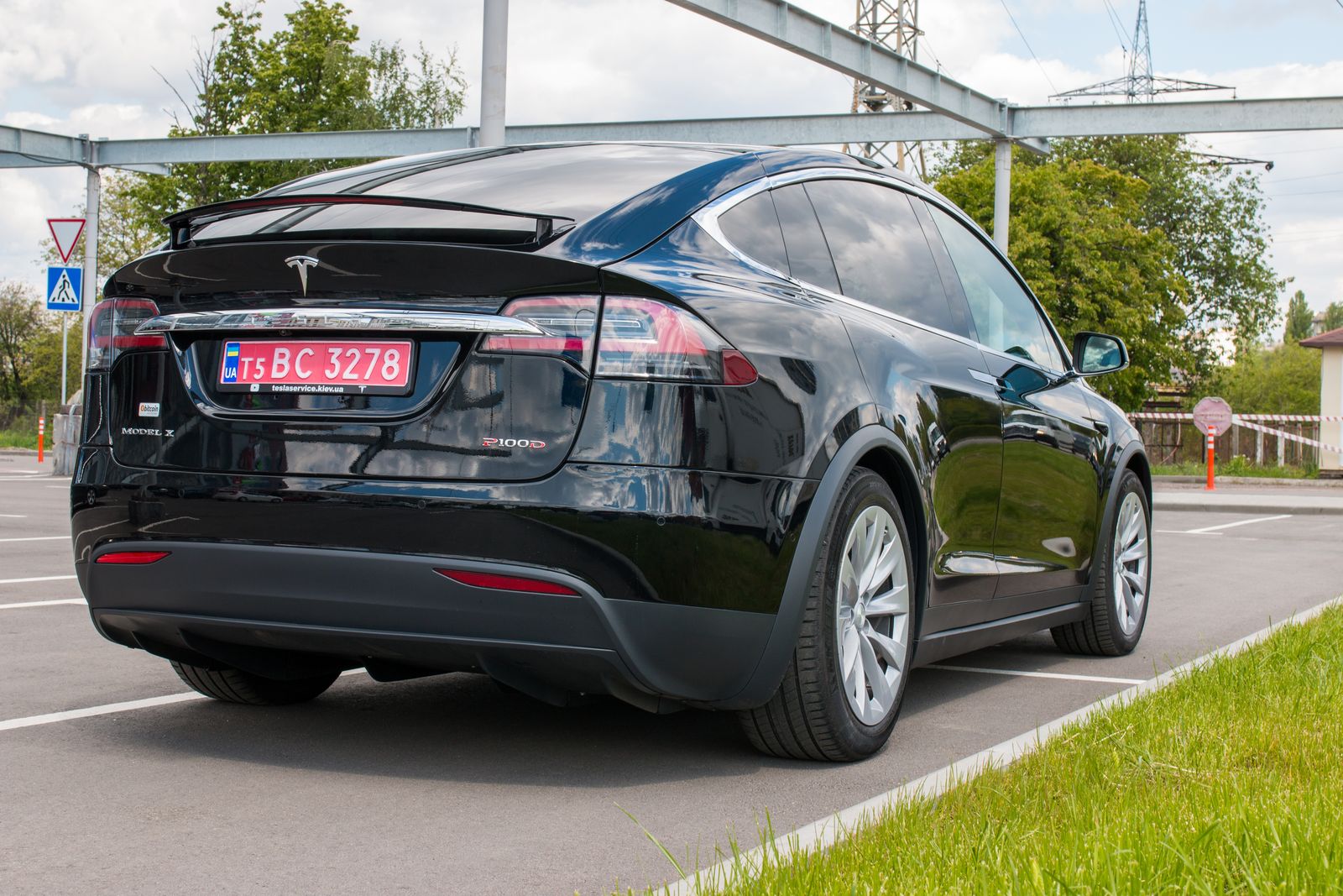 Rear view of a Tesla Model X P100D parked outdoors